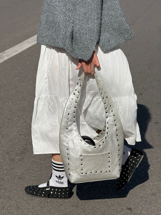 Big studded bag in metallic silver
